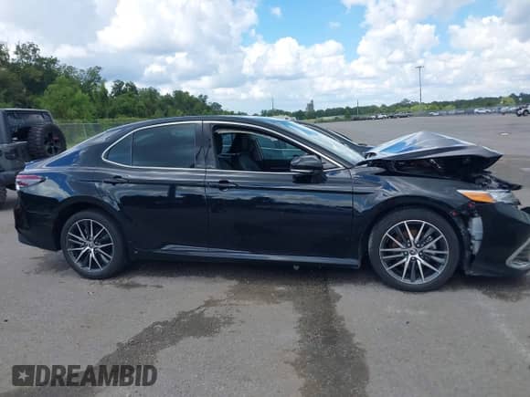 2024 Toyota Camry XLE with VIN 4T1F11AK2RU898129, listed as a IAAI auction lot 43292653 with Not provided miles and . Bid and sale history available at DreamBid. Image 13.