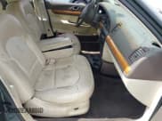 ✅ 1998 Lincoln Continental • VIN: 1LNFM97V6WY671313 • Lot: 42304977. Wystawiony na IAAI z przebiegiem 204 876 mil. Bezpłatny archiwum sprzedaży aukcyjnych z USA i szczegółowy raport historii pojazdu na DreamBid. Zdjęcie 5.