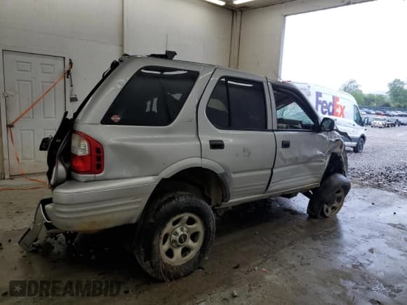 ✅ 2002 Isuzu Rodeo • VIN: 4S2DM58W924331185 • Лот: 62650715. Опубликован ранее на Copart с пробегом Не указан. Бесплатный доступ к архиву аукционных продаж из США и подробный отчёт об истории автомобиля на DreamBid. Изображение 3.