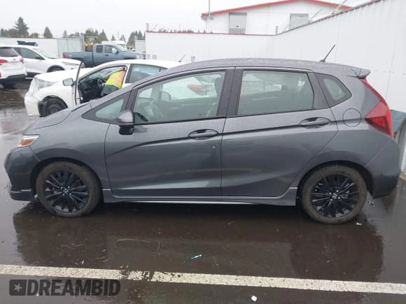 ✅ 2018 Honda Fit Sport • VIN: 3HGGK5G69JM706531 • Лот: 43347203. Опубликован ранее на IAAI с пробегом 51 825 миль. Бесплатный доступ к архиву аукционных продаж из США и подробный отчёт об истории автомобиля на DreamBid. Изображение 14.