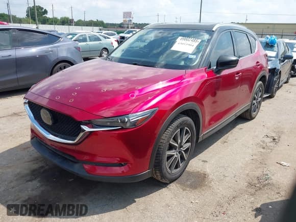 ✅ 2018 Mazda CX-5 Grand Touring • VIN: JM3KFADM3J1394722 • Lot: 43053904. Listed on IAAI with 111,491 mi. Free auction sales archive from the USA and detailed vehicle history report at DreamBid. Image 17.