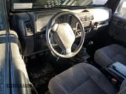 ✅ 1998 Jeep Wrangler Sport • VIN: 1J4FY19S6WP798446 • Лот: 87414845. Опубликован ранее на Copart с пробегом 174 385 миль. Бесплатный доступ к архиву аукционных продаж из США и подробный отчёт об истории автомобиля на DreamBid. Изображение 8.