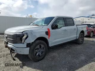✅ 2023 Ford F-150 Lightning Pro • VIN: 1FT6W1EVXPWG39027 • Lot: 44869744. Listed on Copart with 2,260 mi. Free auction sales archive from the USA and detailed vehicle history report at DreamBid. Image 1.