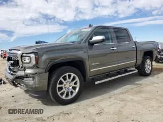 ✅ 2018 GMC Sierra 1500 Denali • VIN: 3GTP1PEC2JG569761 • Lot: 46148995. Listed on Copart with 33,196 mi. Free auction sales archive from the USA and detailed vehicle history report at DreamBid. Image 1.