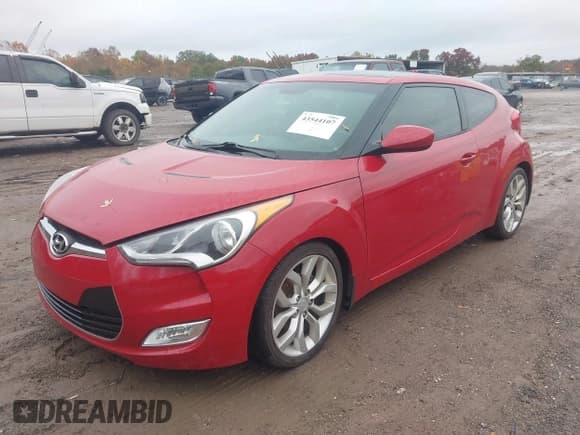 ✅ 2012 Hyundai Veloster w/Red Int • VIN: KMHTC6AD5CU066240 • Lot: 43544107. Listed on IAAI with 196,722 mi. Free auction sales archive from the USA and detailed vehicle history report at DreamBid. Image 2.