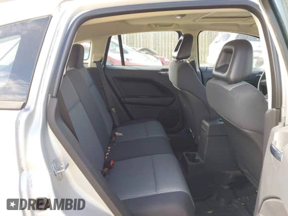 2009 Dodge Caliber SXT z VIN 1B3HB48A59D171609, wystawiony jako IAAI lot #43539239 z przebiegiem 81 569 mil mil oraz . Historia ofert i sprzedaży dostępna na DreamBid. Obrazek 8.