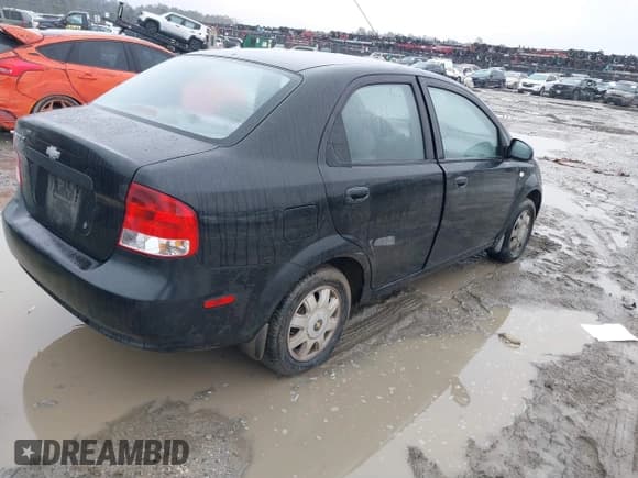 ✅ 2005 Chevrolet Aveo LT • VIN: KL1TG52605B480079 • Lot: 41757862. Wystawiony na IAAI z przebiegiem 163 561 mil. Bezpłatny archiwum sprzedaży aukcyjnych z USA i szczegółowy raport historii pojazdu na DreamBid. Zdjęcie 4.