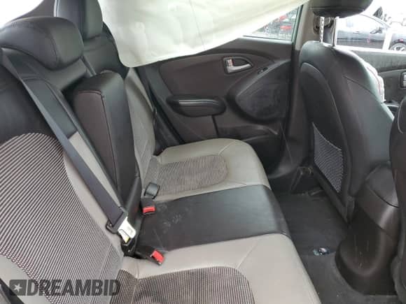 2013 Hyundai Tucson GLS z VIN KM8JU3AC4DU546815, wystawiony jako Copart lot #60543454 z przebiegiem 158 613 mil mil oraz Szkoda całkowita • Salvage title. Historia ofert i sprzedaży dostępna na DreamBid. Obrazek 11.