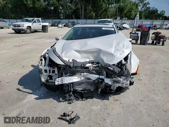 ✅ 2021 Honda Civic EX-L • VIN: 19XFC1F73ME000874 • Lot: 70060905. Listed on Copart with 25,060 mi. Free auction sales archive from the USA and detailed vehicle history report at DreamBid. Image 14.