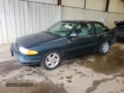 ✅ 1996 Ford Escort • VIN: 1FASP11J0TW123967 • Лот: 52859835. Опубликован ранее на Copart с пробегом 164 693 миль. Бесплатный доступ к архиву аукционных продаж из США и подробный отчёт об истории автомобиля на DreamBid. Изображение 1.