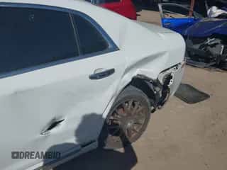 2012 Chevrolet Malibu LTZ with VIN 1G1ZG5E7XCF267663, listed as a IAAI auction lot 43282949 with 161,832 mi miles and . Bid and sale history available at DreamBid. Image 6.