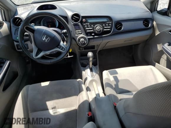 ✅ 2010 Honda Insight EX • VIN: JHMZE2H75AS003910 • Lot: 56485995. Listed on Copart with 104,685 mi. Free auction sales archive from the USA and detailed vehicle history report at DreamBid. Image 8.