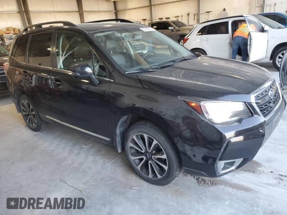 2018 Subaru Forester Touring с VIN JF2SJGWC7JH543947, выставлен на аукционе Copart как лот 69349005 с пробегом 61 575 миль миль и Списание • Salvage title. История ставок и продаж доступна на DreamBid. Изображение 4.