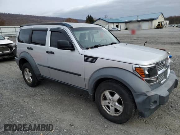 2007 Dodge Nitro SXT с VIN 1D8GU28K47W580088, выставлен на аукционе Copart как лот 80461184 с пробегом 194 480 миль миль и Списание • Salvage title. История ставок и продаж доступна на DreamBid. Изображение 4.