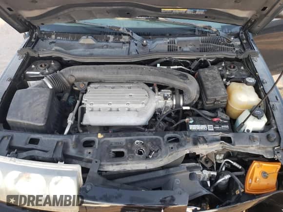 2004 Saturn VUE V6 z VIN 5GZCZ53484S889931, wystawiony jako Copart lot #73196244 z przebiegiem 188 993 mil mil oraz Szkoda całkowita • Salvage title. Historia ofert i sprzedaży dostępna na DreamBid. Obrazek 13.