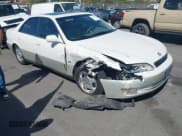 ✅ 1999 Lexus ES 300 • VIN: JT8BF28G3X5067823 • Lot: 43357754. Listed on IAAI with 139,377 mi. Free auction sales archive from the USA and detailed vehicle history report at DreamBid. Image 1.