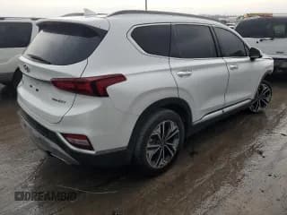 ✅ 2019 Hyundai Santa Fe Ultimate • VIN: 5NMS5CAA4KH021309 • Лот: 36098413. Опубликован ранее на Copart с пробегом 76 221 миль. Бесплатный доступ к архиву аукционных продаж из США и подробный отчёт об истории автомобиля на DreamBid. Изображение 3.