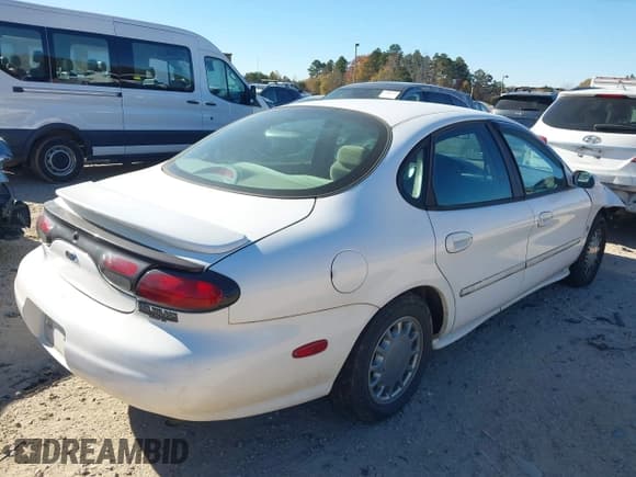 ✅ 1998 Ford Taurus SE Comfort • VIN: 1FAFP53S6WA158707 • Lot: 43664264. Wystawiony na IAAI z przebiegiem 94 283 mil. Bezpłatny archiwum sprzedaży aukcyjnych z USA i szczegółowy raport historii pojazdu na DreamBid. Zdjęcie 4.