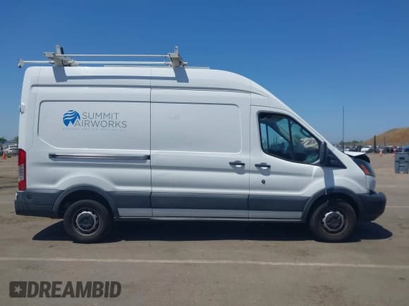 ✅ 2015 Ford Transit Cargo • VIN: 1FTNR2XM9FKA18848 • Lot: 42218203. Listed on IAAI with 162,184 mi. Free auction sales archive from the USA and detailed vehicle history report at DreamBid. Image 14.