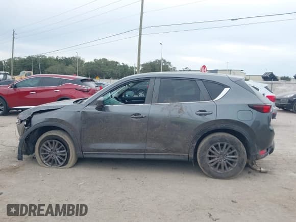 ✅ 2021 Mazda CX-5 Touring • VIN: JM3KFBCM5M0362002 • Lot: 43632624. Wystawiony na IAAI z przebiegiem 76 380 mil. Bezpłatny archiwum sprzedaży aukcyjnych z USA i szczegółowy raport historii pojazdu na DreamBid. Zdjęcie 14.