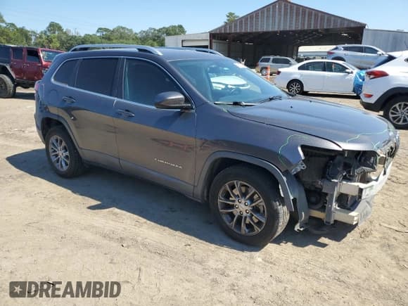✅ 2019 Jeep Cherokee Altitude • VIN: 1C4PJLLB7KD204218 • Lot: 86117735. Listed on Copart with 214,707 mi. Free auction sales archive from the USA and detailed vehicle history report at DreamBid. Image 4.