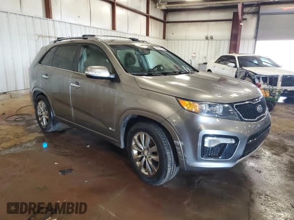 ✅ 2012 Kia Sorento SX • VIN: 5XYKWDA21CG243698 • Лот: 65516165. Опубликован ранее на Copart с пробегом 161 936 миль. Бесплатный доступ к архиву аукционных продаж из США и подробный отчёт об истории автомобиля на DreamBid. Изображение 4.