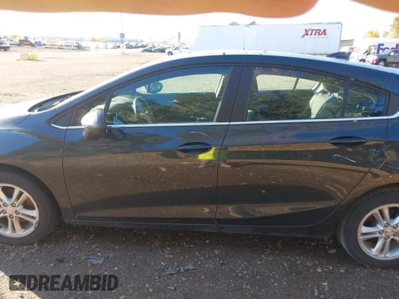 ✅ 2018 Chevrolet Cruze LT • VIN: 3G1BE6SM7JS645177 • Lot: 43475388. Listed on IAAI with 107,539 mi. Free auction sales archive from the USA and detailed vehicle history report at DreamBid. Image 14.
