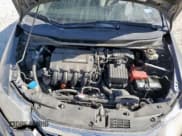 ✅ 2013 Honda Insight LX • VIN: JHMZE2H59DS003833 • Lot: 92709585. Listed on Copart with Not provided. Free auction sales archive from the USA and detailed vehicle history report at DreamBid. Image 11.