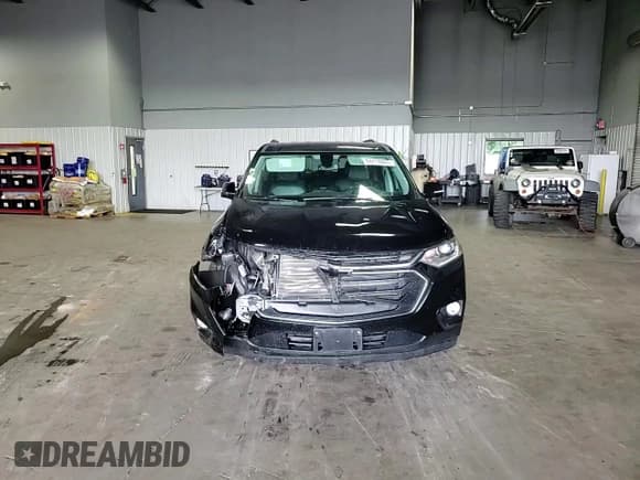 ✅ 2019 Chevrolet Traverse High Country • VIN: 1GNEVJKW0KJ310961 • Lot: 64414885. Listed on Copart with 124,946 mi. Free auction sales archive from the USA and detailed vehicle history report at DreamBid. Image 14.