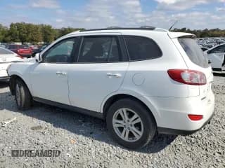 ✅ 2010 Hyundai Santa Fe Limited • VIN: 5NMSKDAG7AH398783 • Lot: 77466904. Listed on Copart with 194,276 mi. Free auction sales archive from the USA and detailed vehicle history report at DreamBid. Image 2.