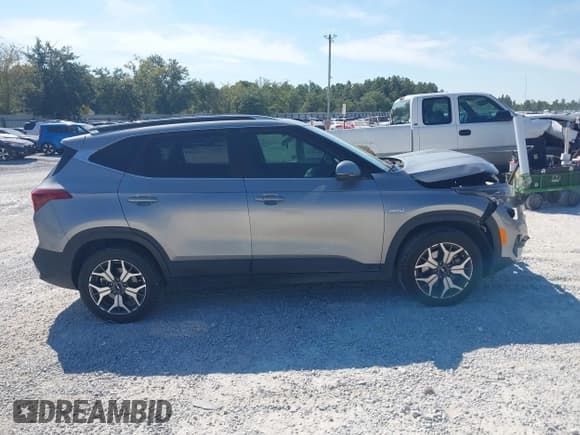 ✅ 2023 Kia Seltos EX • VIN: KNDERCAA6P7402823 • Лот: 43217269. Опубликован ранее на IAAI с пробегом 60 472 миль. Бесплатный доступ к архиву аукционных продаж из США и подробный отчёт об истории автомобиля на DreamBid. Изображение 14.