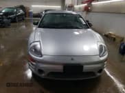 ✅ 2004 Mitsubishi Eclipse RS • VIN: 4A3AC34G04E064100 • Lot: 82203284. Wystawiony na Copart z przebiegiem 109 931 mil. Bezpłatny archiwum sprzedaży aukcyjnych z USA i szczegółowy raport historii pojazdu na DreamBid. Zdjęcie 5.