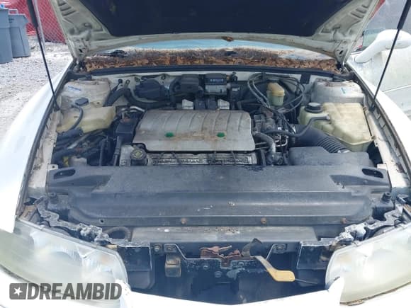 ✅ 1999 Oldsmobile Aurora • VIN: 1G3GR62CXX4100897 • Lot: 42277912. Wystawiony na IAAI z przebiegiem 179 680 mil. Bezpłatny archiwum sprzedaży aukcyjnych z USA i szczegółowy raport historii pojazdu na DreamBid. Zdjęcie 10.