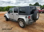 ✅ 2007 Jeep Wrangler Unlimited Sahara • VIN: 1J4GA59147L163936 • Lot: 58422655. Listed on Copart with 225,966 mi. Free auction sales archive from the USA and detailed vehicle history report at DreamBid. Image 2.