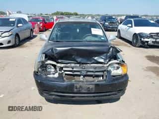 2003 Hyundai Accent GL z VIN KMHCG45C23U427238, wystawiony jako IAAI lot #43412077 z przebiegiem 111 107 mil mil oraz . Historia ofert i sprzedaży dostępna na DreamBid. Obrazek 6.