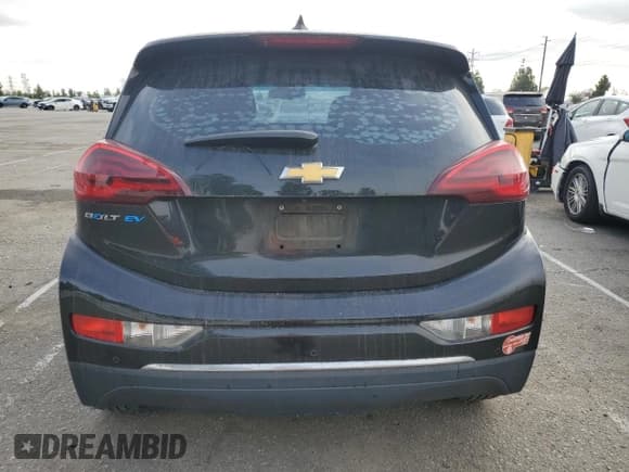 ✅ 2018 Chevrolet Bolt EV LT • VIN: 1G1FW6S03J4136795 • Lot: 82376364. Wystawiony na Copart z przebiegiem 51 828 mil. Bezpłatny archiwum sprzedaży aukcyjnych z USA i szczegółowy raport historii pojazdu na DreamBid. Zdjęcie 6.