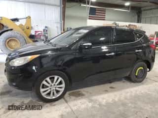 2012 Hyundai Tucson Limited with VIN KM8JUCAC2CU405336, listed as a Copart auction lot 90353775 with 83,563 mi miles and Salvage title. Bid and sale history available at DreamBid. Image 1.