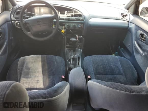 ✅ 1996 Ford Contour • VIN: 1FALP65Z1TK226551 • Lot: 68192825. Listed on Copart with 112,317 mi. Free auction sales archive from the USA and detailed vehicle history report at DreamBid. Image 8.