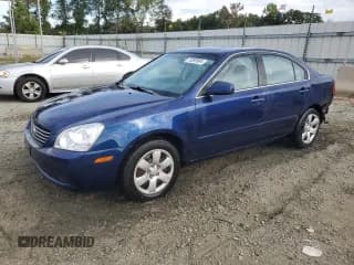 ✅ 2007 Kia Optima LX • VIN: KNAGE123875125447 • Лот: 70399984. Опубликован ранее на Copart с пробегом 223 846 миль. Бесплатный доступ к архиву аукционных продаж из США и подробный отчёт об истории автомобиля на DreamBid. Изображение 1.