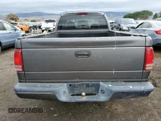 ✅ 2002 Dodge Dakota • VIN: 1B7GL12XX2S718443 • Lot: 84568934. Wystawiony na Copart z przebiegiem 122 127 mil. Bezpłatny archiwum sprzedaży aukcyjnych z USA i szczegółowy raport historii pojazdu na DreamBid. Zdjęcie 6.