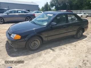 ✅ 2000 Mazda Protege DX • VIN: JM1BJ2227Y0243767 • Lot: 61022515. Wystawiony na Copart z przebiegiem 81 846 mil. Bezpłatny archiwum sprzedaży aukcyjnych z USA i szczegółowy raport historii pojazdu na DreamBid. Zdjęcie 1.