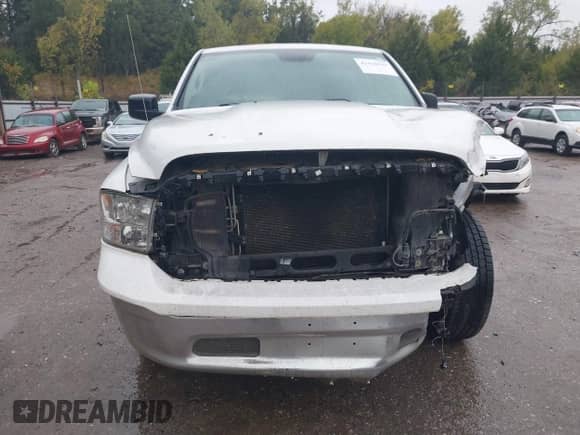 2016 Ram 1500 Tradesman z VIN 3C6JR6DT8GG257406, wystawiony jako IAAI lot #43430639 z przebiegiem 88 663 mil mil oraz . Historia ofert i sprzedaży dostępna na DreamBid. Obrazek 13.