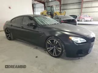 ✅ 2016 BMW M6 • VIN: WBS6E9C53GGF92658 • Lot: 79003953. Wystawiony na Copart z przebiegiem 49 231 mil. Bezpłatny archiwum sprzedaży aukcyjnych z USA i szczegółowy raport historii pojazdu na DreamBid. Zdjęcie 4.