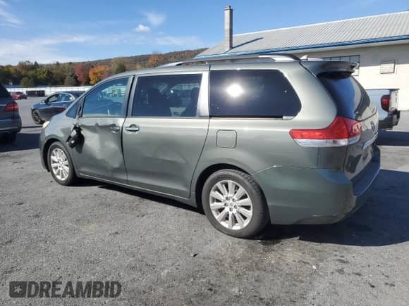 2011 Toyota Sienna XLE AAS with VIN 5TDYK3DC0BS096862, listed as a Copart auction lot 90372925 with 329,114 mi miles and Salvage title. Bid and sale history available at DreamBid. Image 2.