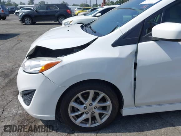 ✅ 2012 Mazda 5 Touring • VIN: JM1CW2CL2C0125776 • Lot: 42496258. Wystawiony na IAAI z przebiegiem 130 522 mil. Bezpłatny archiwum sprzedaży aukcyjnych z USA i szczegółowy raport historii pojazdu na DreamBid. Zdjęcie 13.