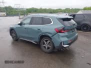 ✅ 2024 BMW X1 xDrive28i • VIN: WBX73EF03R5Y60469 • Lot: 42231110. Listed on IAAI with 6,860 mi. Free auction sales archive from the USA and detailed vehicle history report at DreamBid. Image 3.