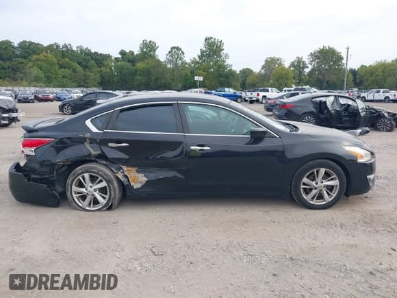 ✅ 2014 Nissan Altima SV • VIN: 1N4AL3AP8EC902254 • Lot: 43296802. Listed on IAAI with 142,997 mi. Free auction sales archive from the USA and detailed vehicle history report at DreamBid. Image 12.