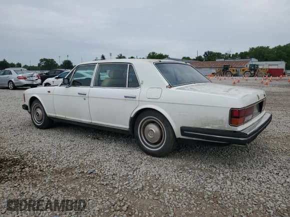 ✅ 1985 Rolls-Royce Silver Spur • VIN: SCAZN42AXFCX12584 • Lot: 59930415. Listed on Copart with 57,381 mi. Free auction sales archive from the USA and detailed vehicle history report at DreamBid. Image 2.