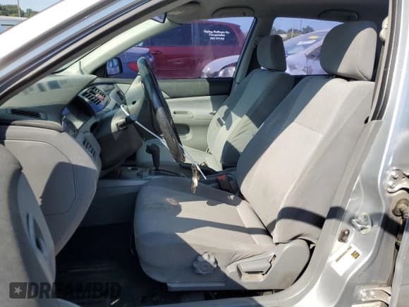 ✅ 2006 Mitsubishi Lancer ES • VIN: JA3AJ26E26U067912 • Lot: 66493134. Wystawiony na Copart z przebiegiem 229 359 mil. Bezpłatny archiwum sprzedaży aukcyjnych z USA i szczegółowy raport historii pojazdu na DreamBid. Zdjęcie 7.