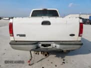 ✅ 2002 Ford F-250 XL • VIN: 1FTNW20F82EA21737 • Лот: 93669585. Опубликован ранее на Copart с пробегом 241 098 миль. Бесплатный доступ к архиву аукционных продаж из США и подробный отчёт об истории автомобиля на DreamBid. Изображение 6.